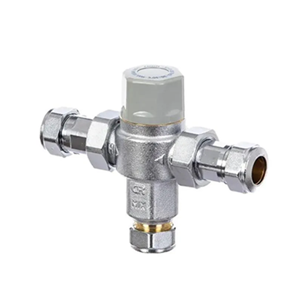 Metal valve with threaded connections on a white background