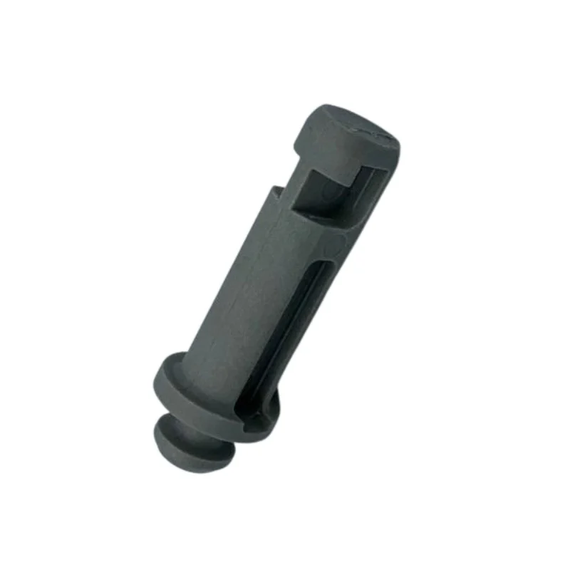 Black plastic plumbing component on a white background