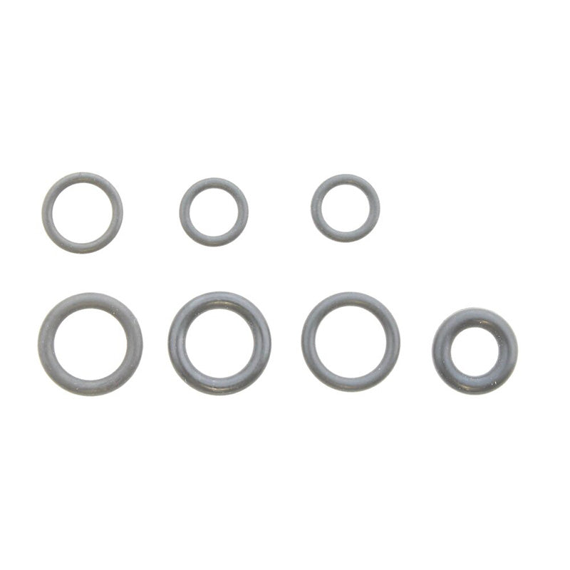 Set of eight gray O-rings on a white background