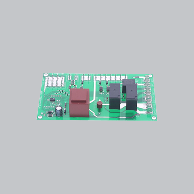 Green electronic circuit board on a gray background