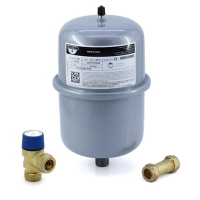 Water filter system with cylindrical filter, brass valve, and connectors on a white background