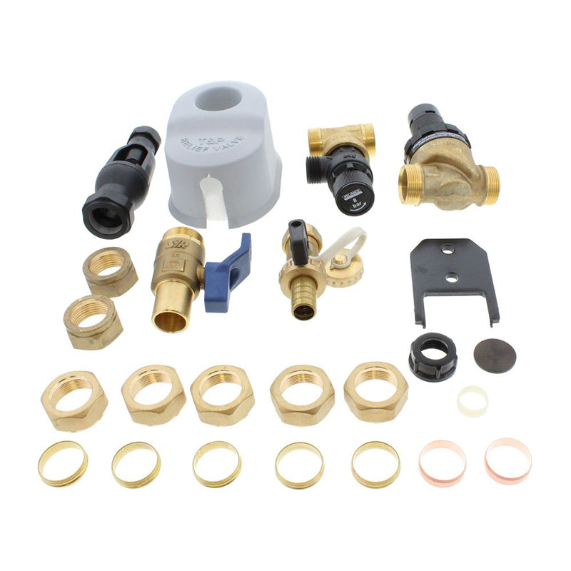 Collection of plumbing parts including valves, connectors, and washers on a white background