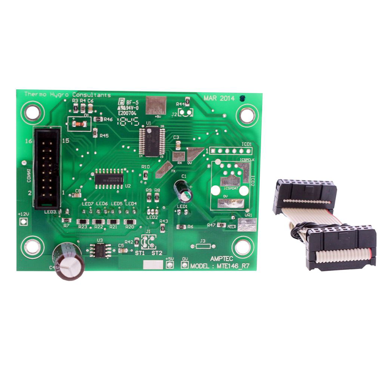 Green electronic circuit board with connectors on a white background