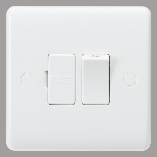 White electrical switch panel with fuse and on/off switches on a gray background