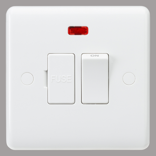 White electrical switch panel with a red indicator light on a gray background