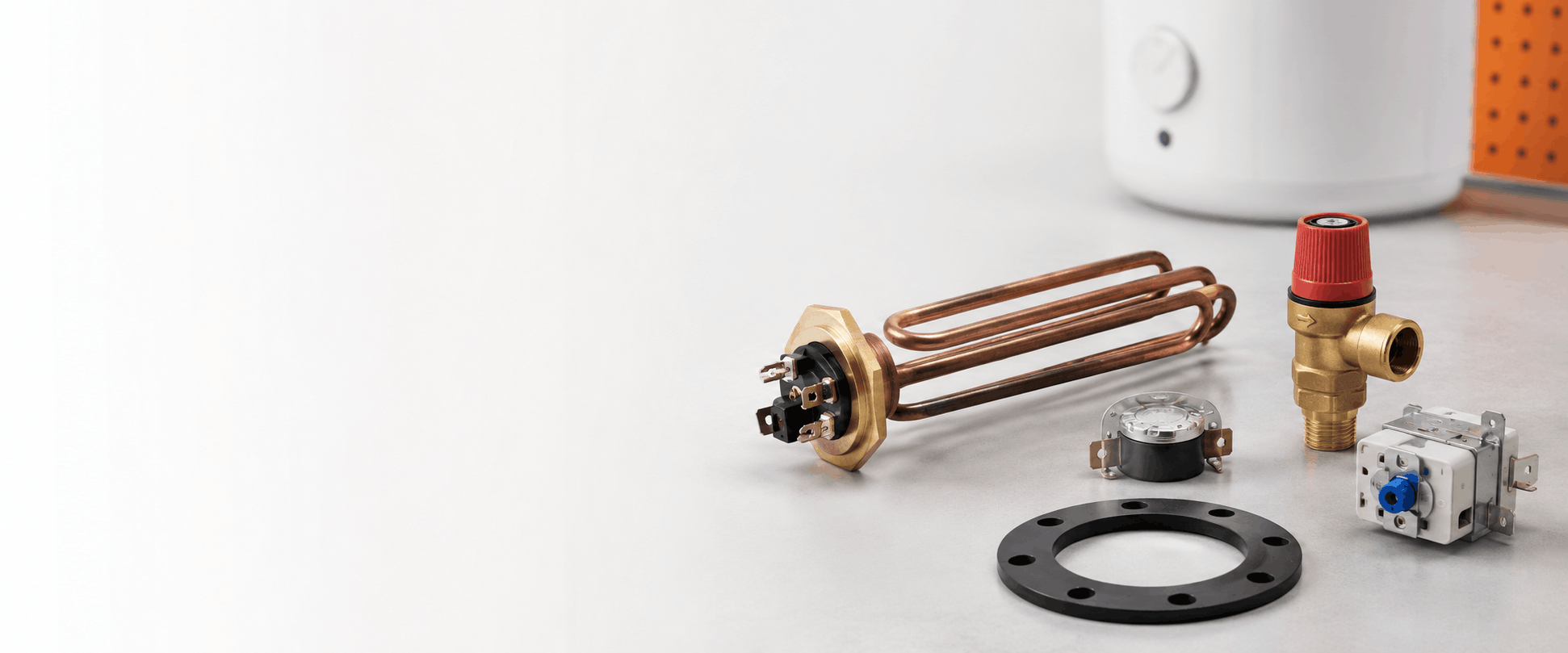 Genuine water heater spare parts including an immersion heater, thermostat, pressure relief valve and gasket