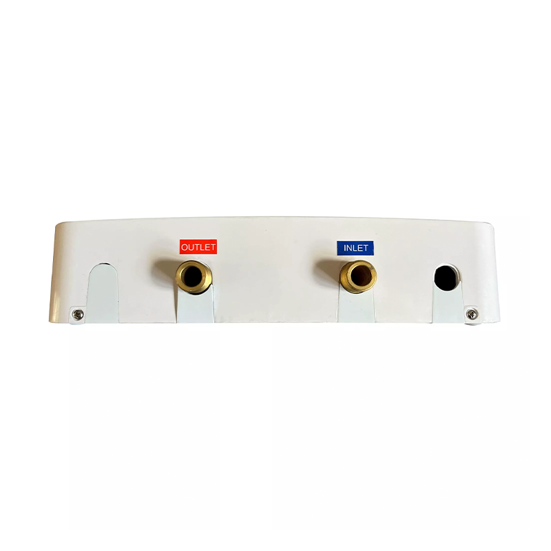 White plumbing manifold with gold outlets labeled 'Outlet' and 'Inlet' on a white background